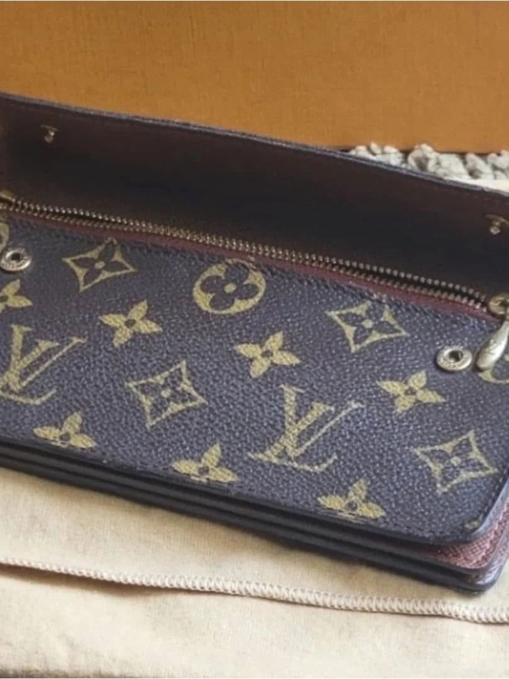 Louis Vuitton Monogram Canvas Accordion Clutch in Brown with Gold Accents
